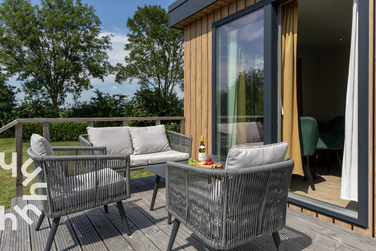 Terrace with garden furniture on the wooden deck